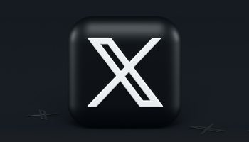 a black square button with a white x on it